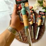 Top Choice Stainless steel spoon with wooden handle in silicone, random color selection