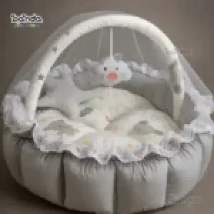 بيبي نيست سرير دائري دبل فيس ، مع بار بلعبة سوفت وناموسية و٢ مخدة اشكال