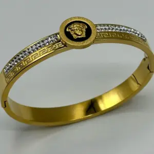 Luxury Gold Bangle with Classic Engraving & Medusa Icon - BR-17