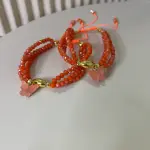 Electric orange bracelet