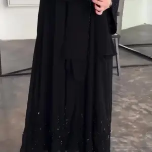 Elegant Black Evening Abaya with Delicate Beading & Crystal Details - Flowy Cut