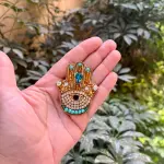 The Golden Hamsa Protection magnet Pin