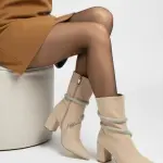 Boots with white belts wrap around it B-43