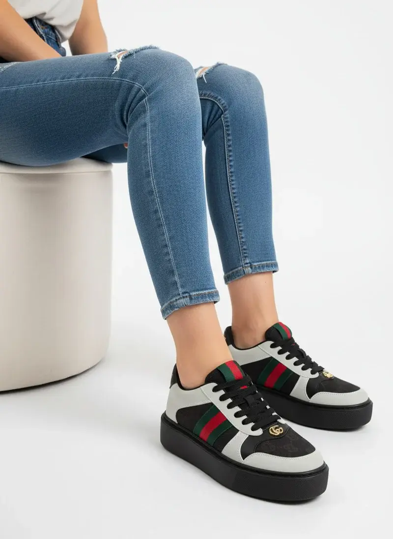 Sneaker featuring signature side stripes SN-18