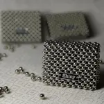 Shiny Silver Beaded Clutch – A Statement of Elegance and Artistry