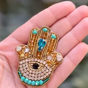 The Golden Hamsa Protection magnet Pin