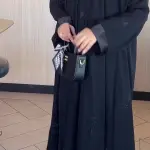 Black Abaya with Subtle Tone-on-Tone Floral Embroidery - Practical Buttoned Design