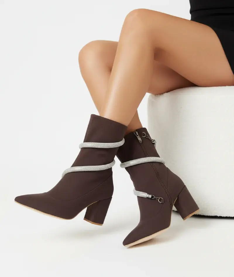 Boots with white belts wrap around it B-43