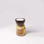 Coconut Shell Candle Bowl on Rustic Stacked Wood Base