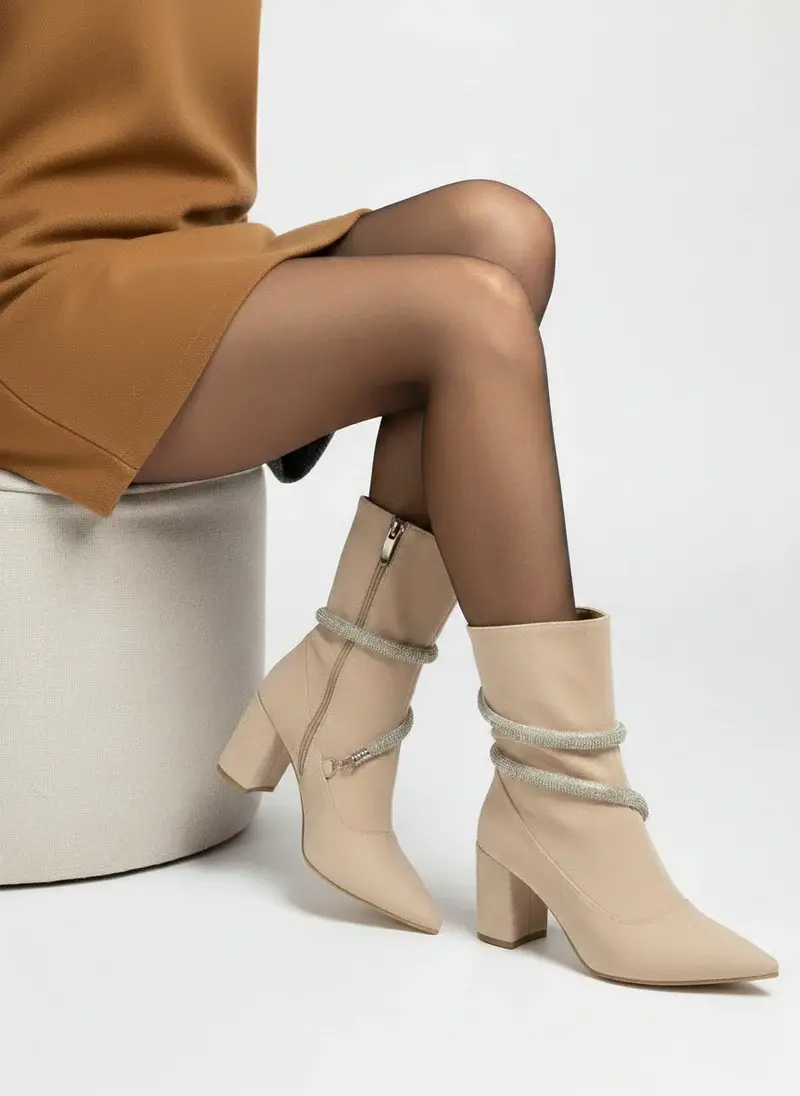Boots with white belts wrap around it B-43