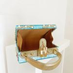 The Must Have Turquoise Masterpiece Clutch